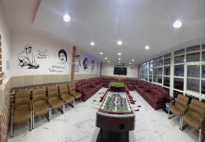 a large room with a poker table and chairs at Happiness Farm in Hatta +12 photos