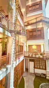 an external view of a building with a balcony at Circle of Life in Baudhatinchule