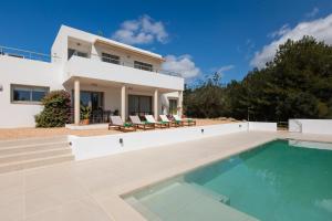 an image of a villa with a swimming pool at Villa Es Redo-Spacious & Relax in Sant Josep de sa Talaia
