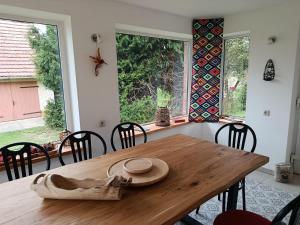 a wooden table with a hat sitting on top of it at Ferienhof Maikito in Lalendorf