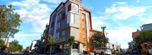 a building on the side of a city street at Hotel Zorba in Bhopal