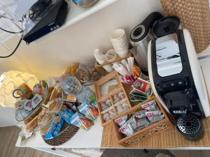 a table with a coffee maker and food on it at B&B La Torre in Realmonte +36 photos
