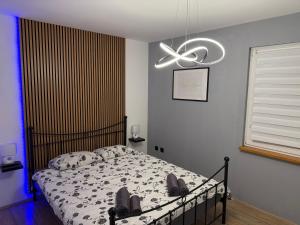 a bedroom with a bed and a ceiling fan at Manolo house with jacuzzi & pool in Pula +17 photos