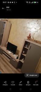 a room with a desk with a computer on it at casa lidia in Brăila