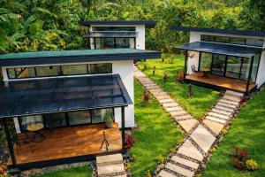 an aerial view of a house with a porch at Natura Bungalows in Fortuna