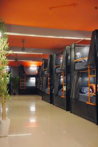 a row of bunk beds in a room at Aostel in Chennai
