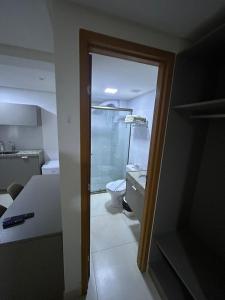 a bathroom with a shower and a toilet in it at Flat Manaira in João Pessoa +7 photos