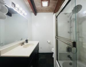 a bathroom with a sink and a shower at Pacific Sands Vacation Home by Vynmir in Fort Bragg +19 photos