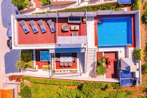 an aerial view of a house with a swimming pool at Villa Radman in Korčula