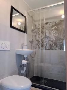 a bathroom with a shower and a toilet and a sink at Quedar-se a l'Alguer in Alghero +85 photos