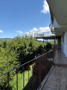 a balcony of a house with a view at El Balcón de Ataco in Concepción de Ataco