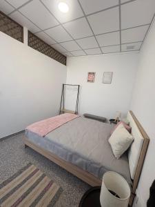 a bedroom with a bed in a room at Casa São Marcos II in Peniche +19 photos