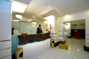 The lobby or reception area at Grand Hotel Piazza Borsa