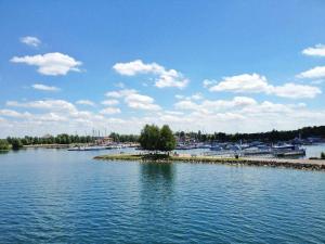 a large body of water with boats in it at Chez Mathieu in Saint-Dizier