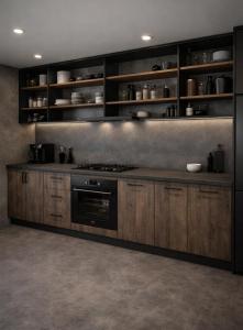 a kitchen with wooden cabinets and a stove at Voltage Lodge Collie in Collie +4 photos