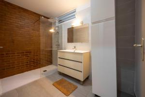 a bathroom with a sink and a shower at Macapa - Destination Guyane in Macouria +14 photos