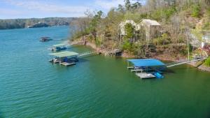an aerial view of a dock on a lake at Sunset Cove - Large Cove, Gorgeous Sunsets, Amenities Galore! in Bremen