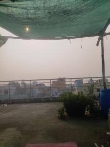 a view from the roof of a house in the fog at Sri kanakdhara homes in Vijayawāda