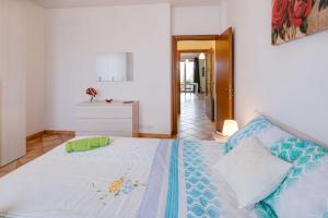 Postel nebo postele na pokoji v ubytování La Casina Del Canneto