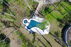 an overhead view of a park with a fountain at La Pino Mount Batur and Hot Spring in Bangli