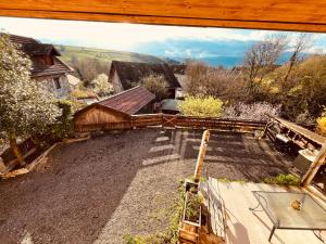 an aerial view of a yard with a barn at Gîte Les sources proche Annecy in Vaulx +15 photos
