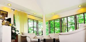 Posezení v ubytování Moosiyard Hometel Khaoyai