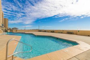 a swimming pool on the roof of a building at Phoenix II 2012 in Orange Beach