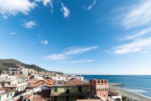 a view of a city and the ocean with buildings at -Fronte Mare- Centro Storico in Varazze