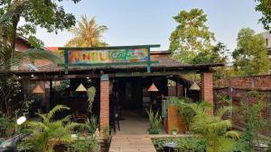 a restaurant with a sign that reads no cat at Anou Home - Guesthouse in Siem Reap