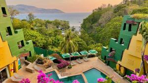 an aerial view of a resort with a swimming pool at Kata Seaview Escape - 1BR Luxury Apartment 90sqm in Phuket