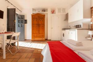 Kuchyň nebo kuchyňský kout v ubytování Apartamentos Gadi Corral Siglo XVI