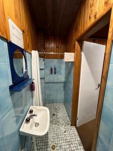 a small bathroom with a sink and a shower at Bunkhouse Motel Cooma in Cooma +87 photos