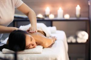 a woman getting a massage at a spa at Riad SPA "Les Portes de l'Orient" TOURS in Tours