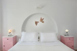 Ένα ή περισσότερα κρεβάτια σε δωμάτιο στο Villa Agrikoia 