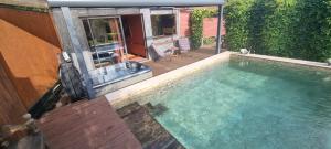 an overhead view of a swimming pool in a house at Étang des Tamaris in Namur
