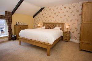 Tempat tidur dalam kamar di The Stapylton Arms