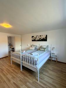 a bedroom with a large bed in a room at M & M home in Karlshamn