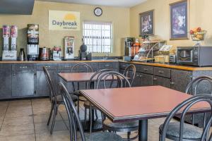 A restaurant or other place to eat at Days Inn by Wyndham Clayton