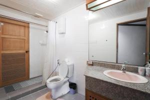 a bathroom with a toilet and a sink at Sky beach view in North Pattaya +39 photos