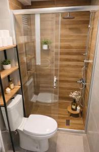 a bathroom with a shower with a toilet and a shower at Soydan World Travel in Antalya +147 photos