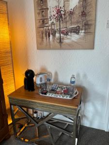 a table with a tray of food on top of it at Crispin House in Hunstanton