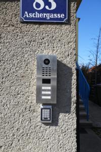 a metal box on the side of a building at Steffens PANTA RHEI in Vienna