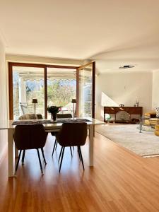 a dining room with a table and some chairs at Molive in Traben-Trarbach
