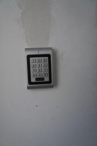 a remote control hanging on a wall at Steffens PANTA RHEI in Vienna