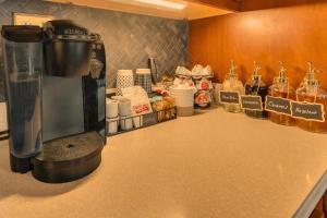 a coffee maker sitting on top of a counter at The John Collins House in Canfield