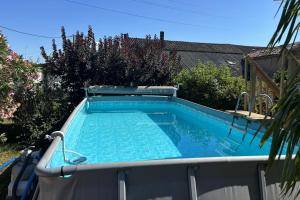 a small swimming pool in a yard with at Le cocon près d'Albi in Saint-Grégoire +15 photos