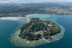 an aerial view of an island in the water at Lakeside Studios Konstanz in Konstanz