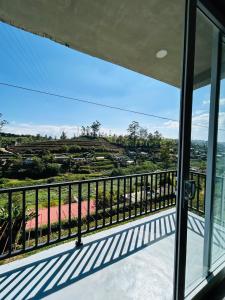 a view from the balcony of a house at Viora Lodge in Nuwara Eliya