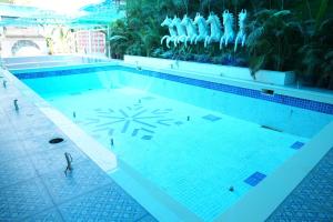 an overhead view of a swimming pool at Ascent Eco Resorts & Conventions in Rājānagaram