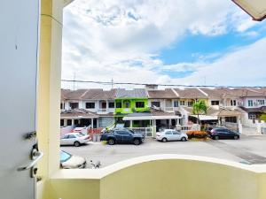 a view of a parking lot with cars parked at 365 House by D'Laksamana in Malacca